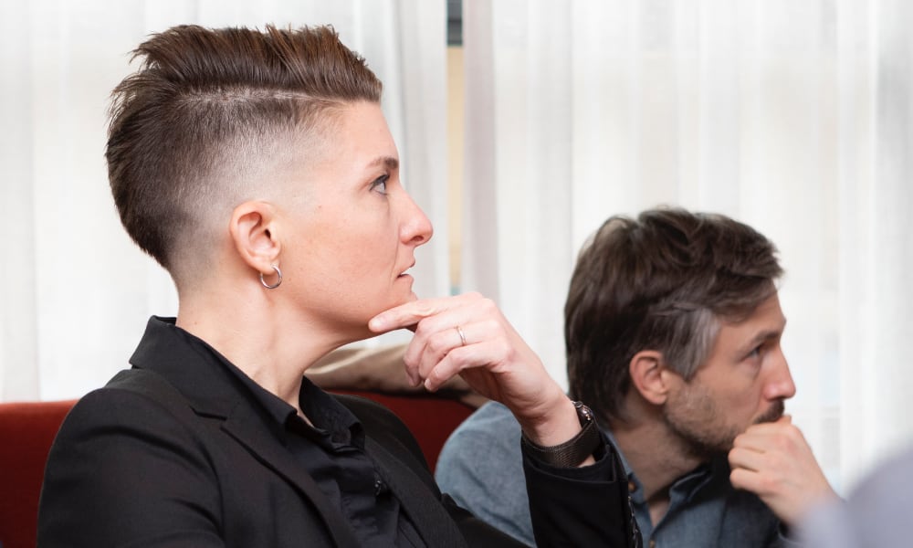 two people concentrating in meeting